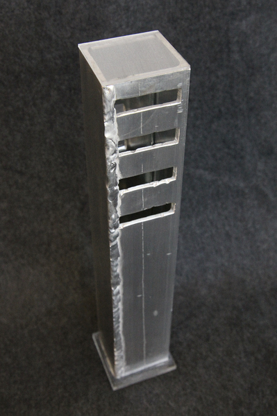 'AUSCHWITZ' - 2013 (12x2x2") aluminum, mirror. 
Also in The LADDER Series