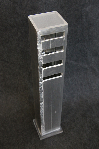 'AUSCHWITZ' - 2013 (12x2x2") aluminum, mirror. 
Also in The LADDER Series