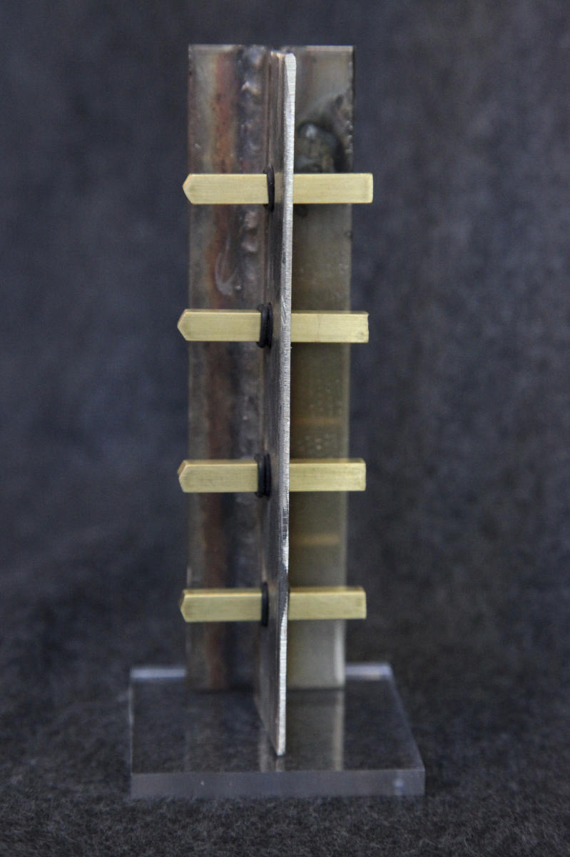 'TWO-FACED' - 2013
 (6"x1.5"x1.75")
steel, brass, rubber
